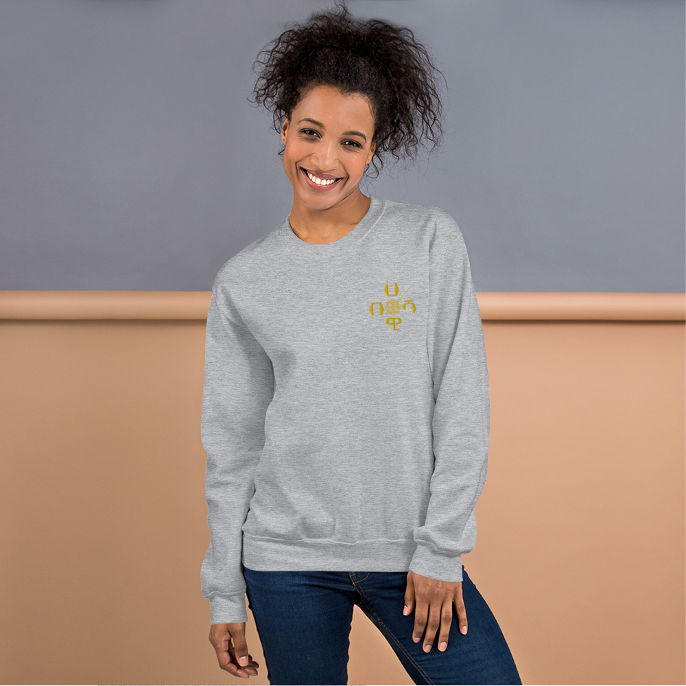 This well-loved X-Habeshawwi Unisex Sweatshirt is the perfect addition to any wardrobe. It has a crew neck, and it's made from air-jet spun yarn and quarter-turned fabric, which eliminates a center crease, reduces pilling, and gives the sweatshirt a soft, comfortable feel. 